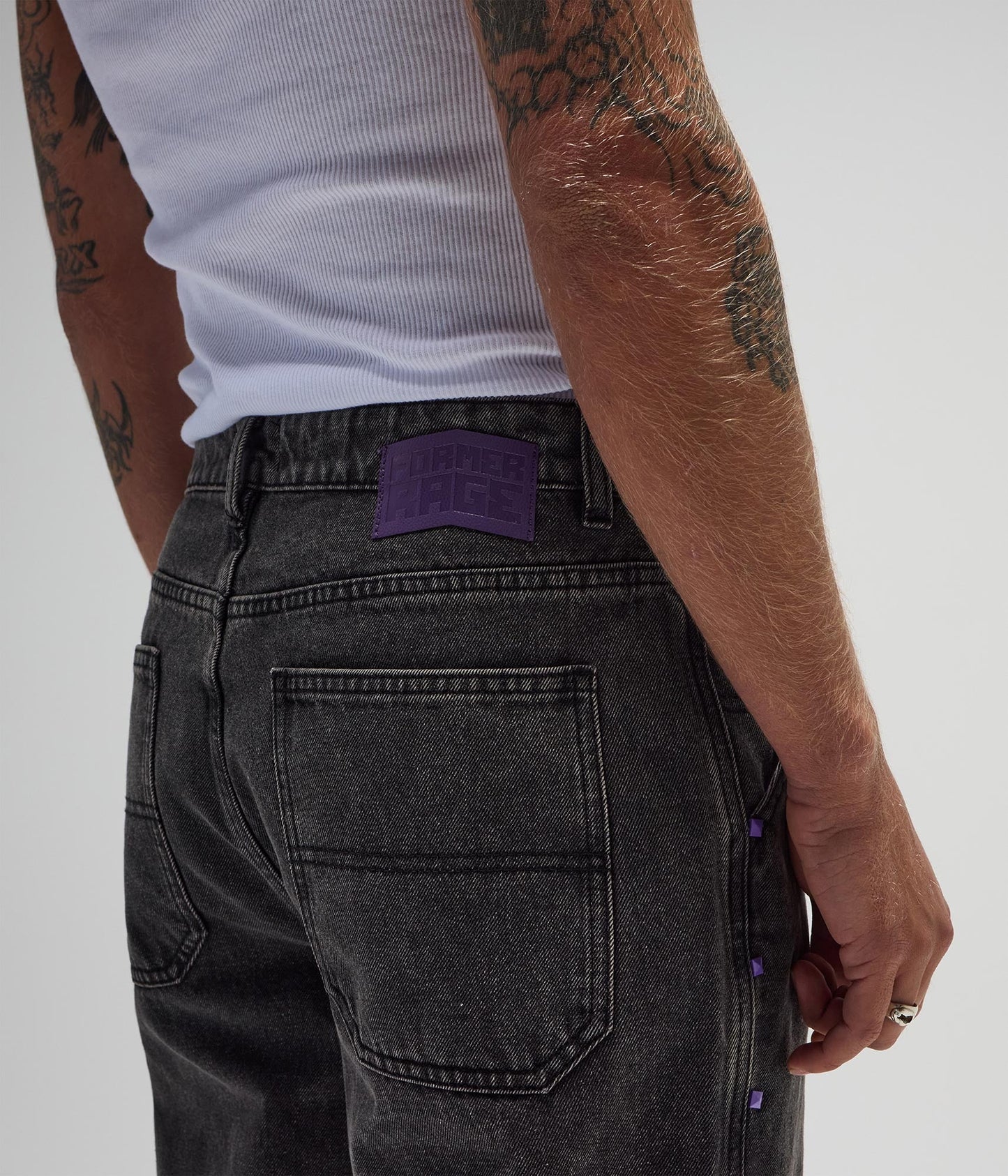 FORMER Studded Denim Pant in Washed Black - FORMER x RAGE Collection