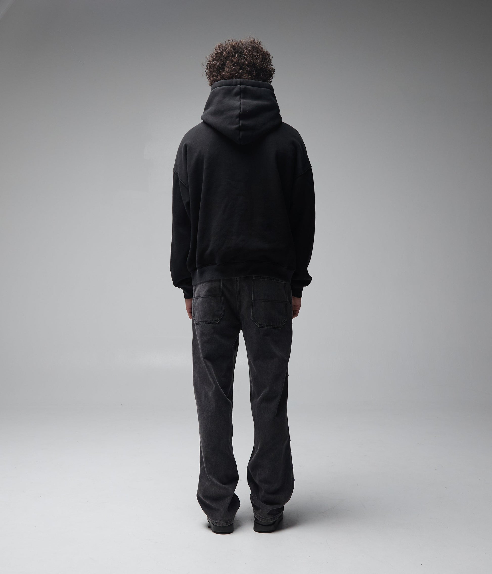 FORMER Skullz Boxy Heavy Hood in Merch Black - FORMER x RAGE Collection