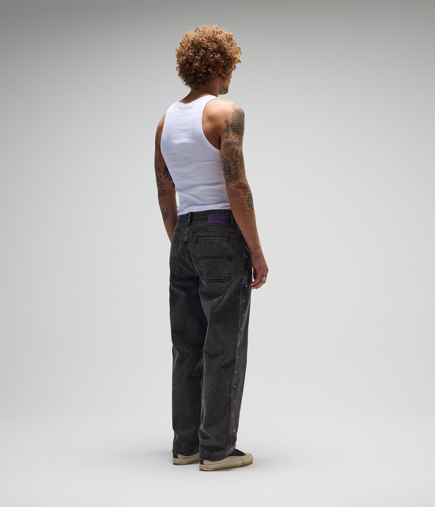 FORMER Studded Denim Pant in Washed Black - FORMER x RAGE Collection