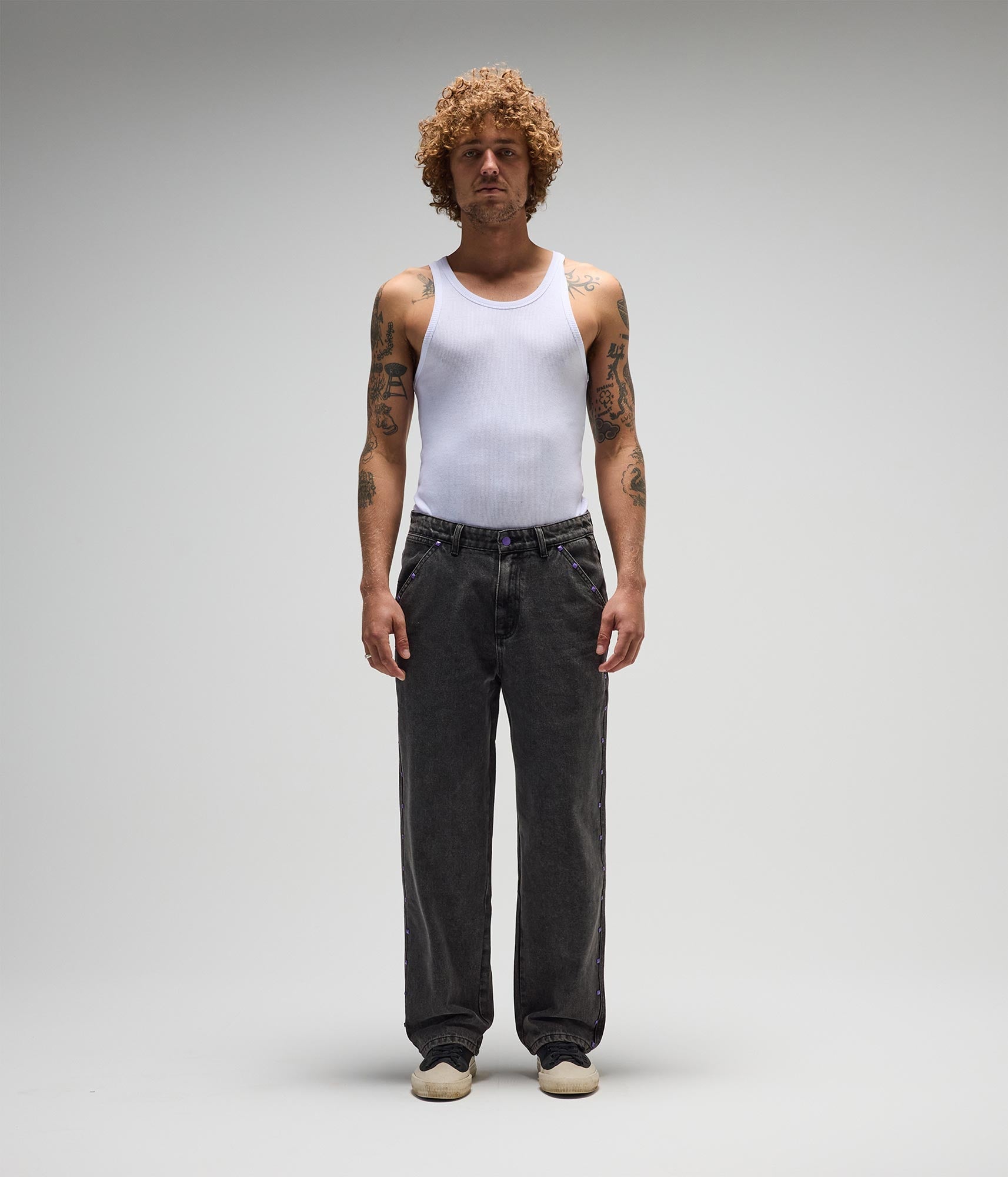 FORMER Studded Denim Pant in Washed Black - FORMER x RAGE Collection